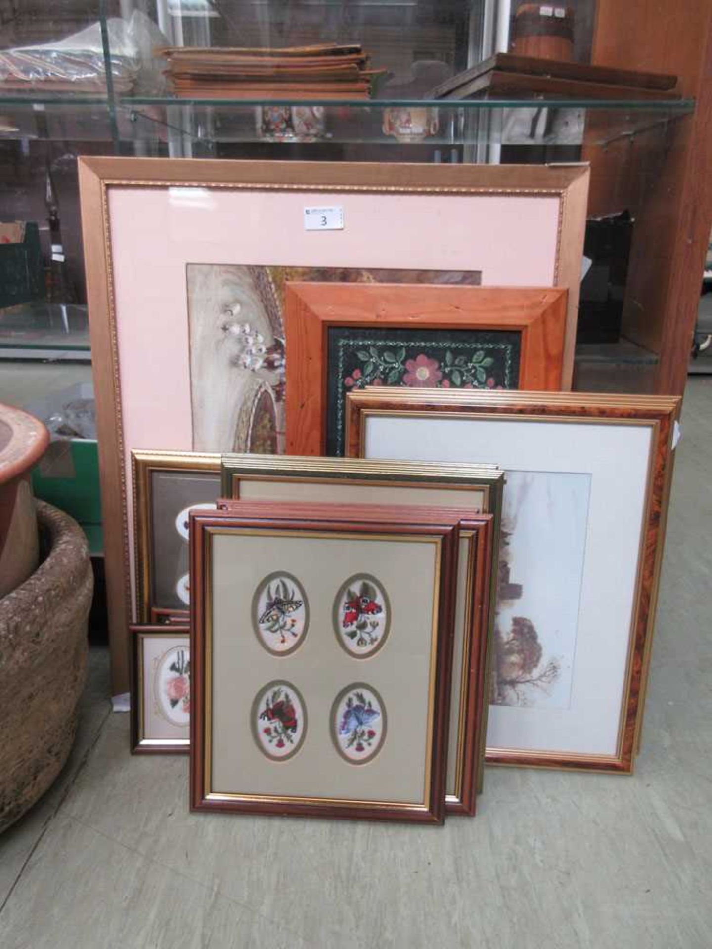 A collection of artworks to include needle works on silk of butterflies and flowers, two watecolours