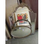 Three ornate framed mirrors