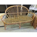 A bamboo and wicker settee