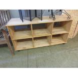 A modern pine low level storage unit