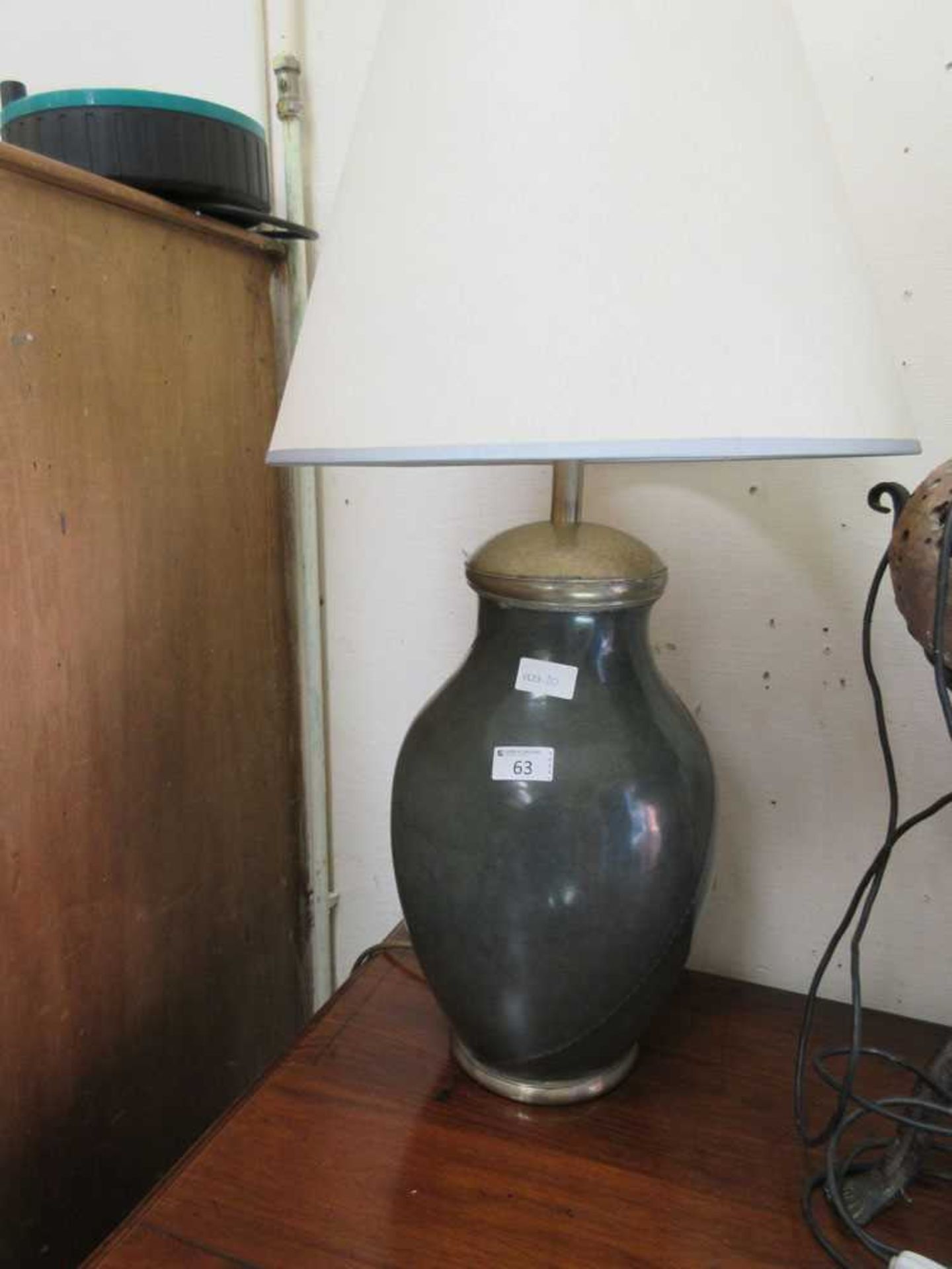 A modern ceramic columned table lamp