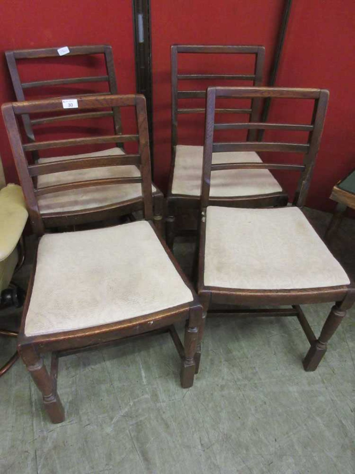 A set of four oak framed early 20th century dining chairs