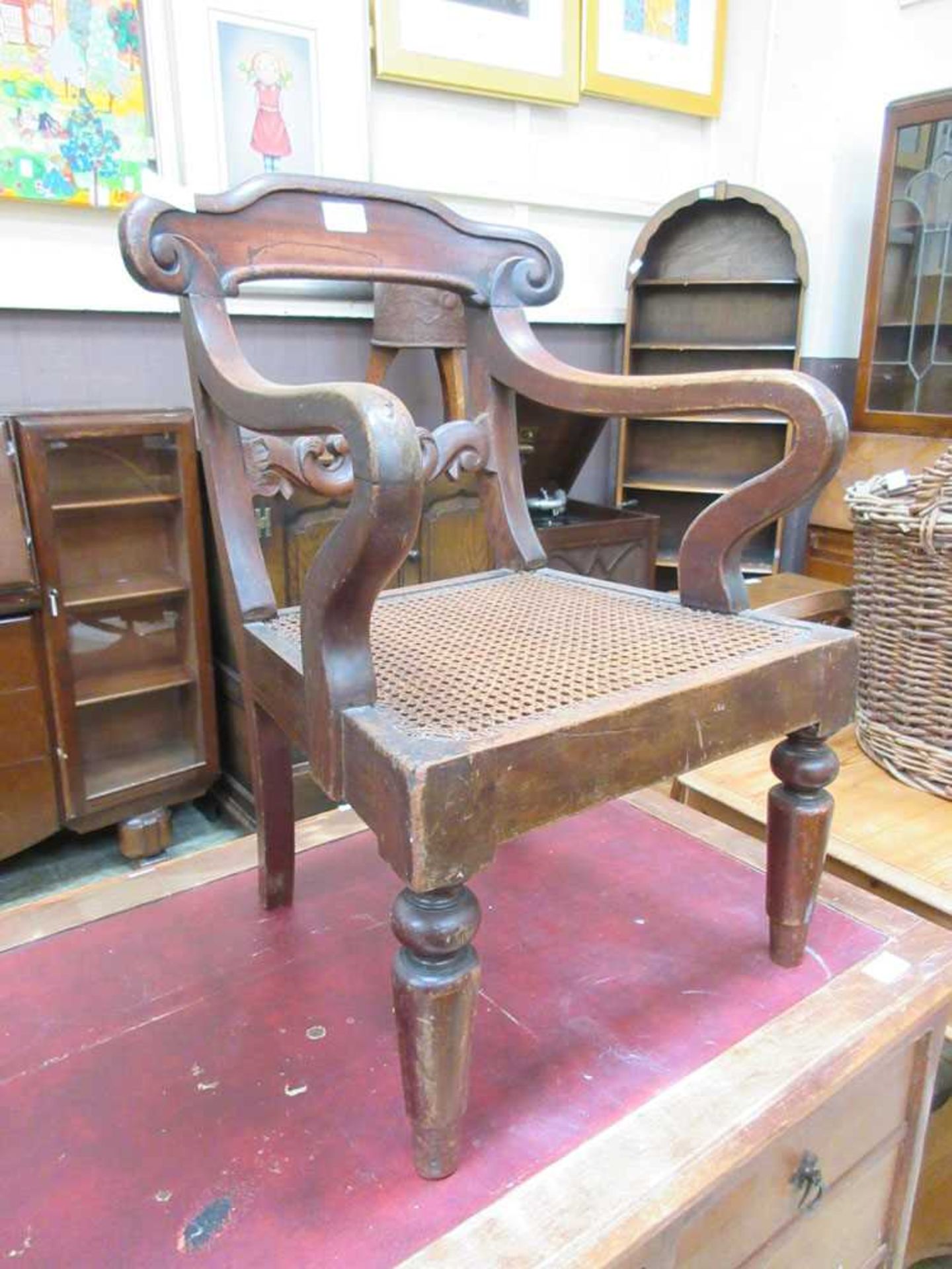 A 19th century mahogany child's chair with cane seat
