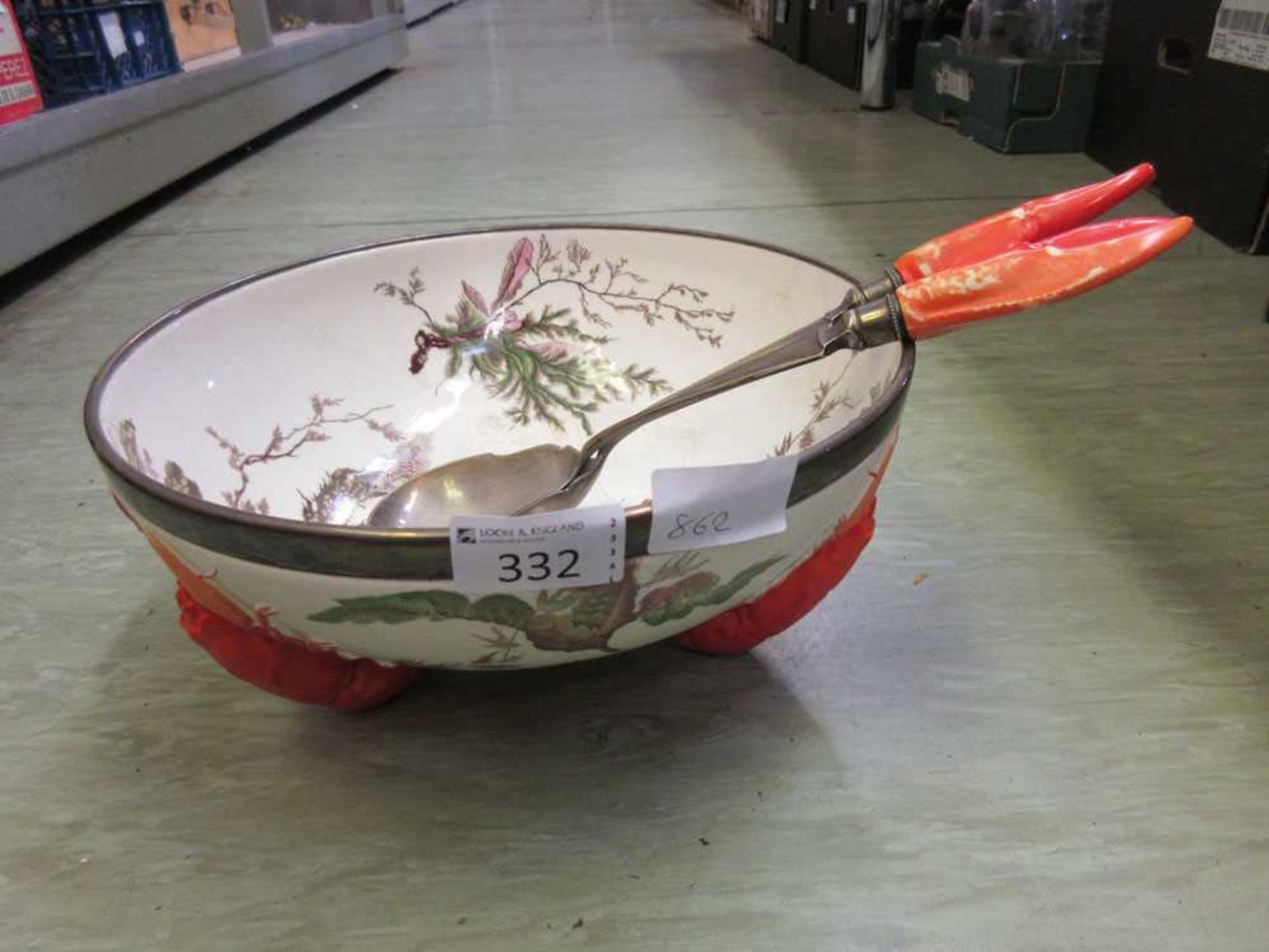 A Wedgwood seaweed pattern salad bowl on three lobster supports, the servers with ceramic claw