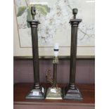 A pair of brass effect fluted columned based table lamps along with one other