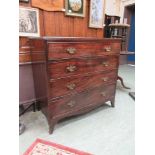 An 18th century mahogany chest of four long drawers