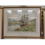 A framed and glazed watercolour of a river scene signed Robert Winter