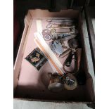 A tray containing an assortment of items to include padlocks, meat jack hooks, horn, etc