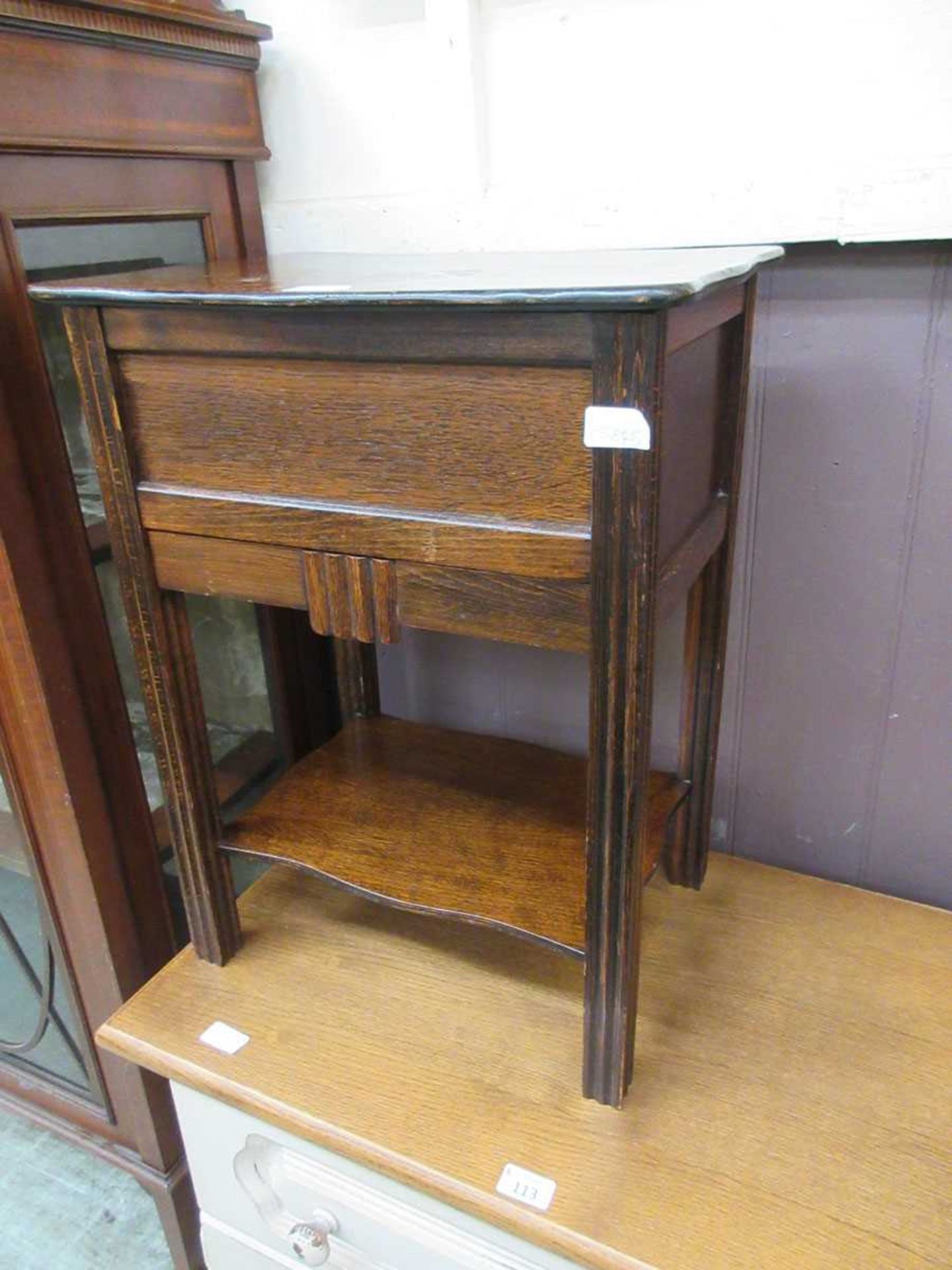 An early 20th century oak work box