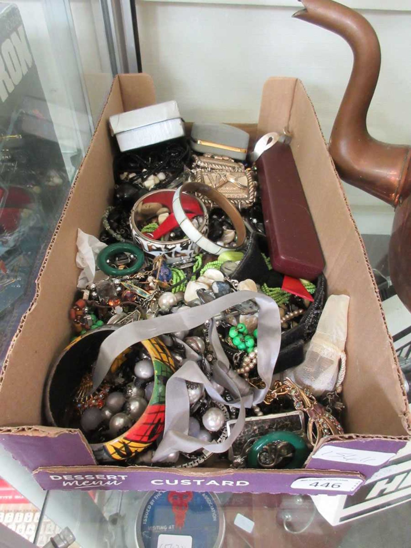 A tray containing a quantity of costume jewellery