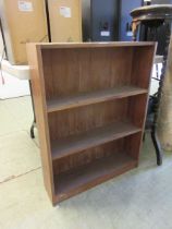 A teak open bookcase