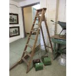 A set of wooden step ladders