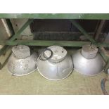 A set of three mid-20th century industrial style ceiling hanging lights