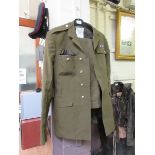 An olive green No. 2 Dress army uniform with cap