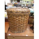 A bamboo and wicker laundry basket