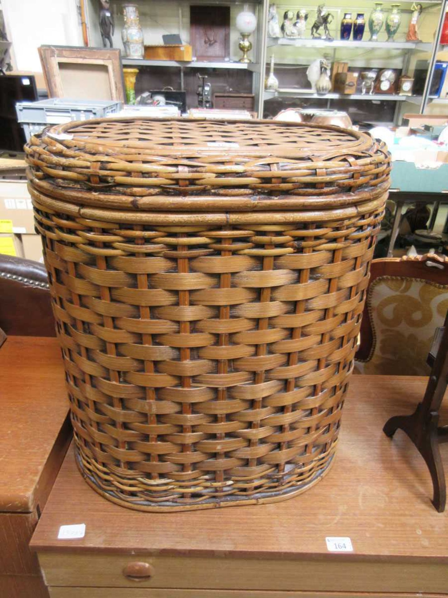 A bamboo and wicker laundry basket