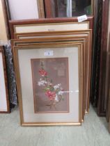 Four framed and glazed paintings of flowers along with a set of four limited edition prints of