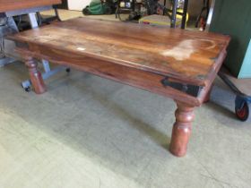 An Indonesian hard wood coffee table