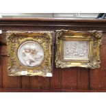 Two ornate gilt framed resin moulded relief panels of putto