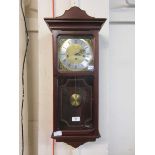 A Metamet drop dial wall hanging clock