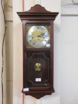 A Metamet drop dial wall hanging clock