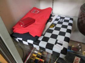 Motor racing related ephemera to include t shirts, Silverstone medal, pad seat, etc