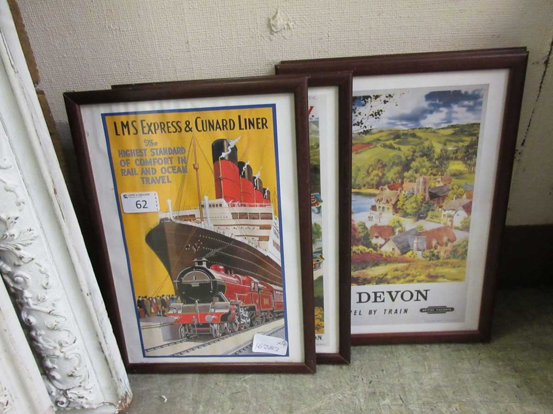Four framed and glazed travel advertising posters to include British Rail, Midland Railway, etc