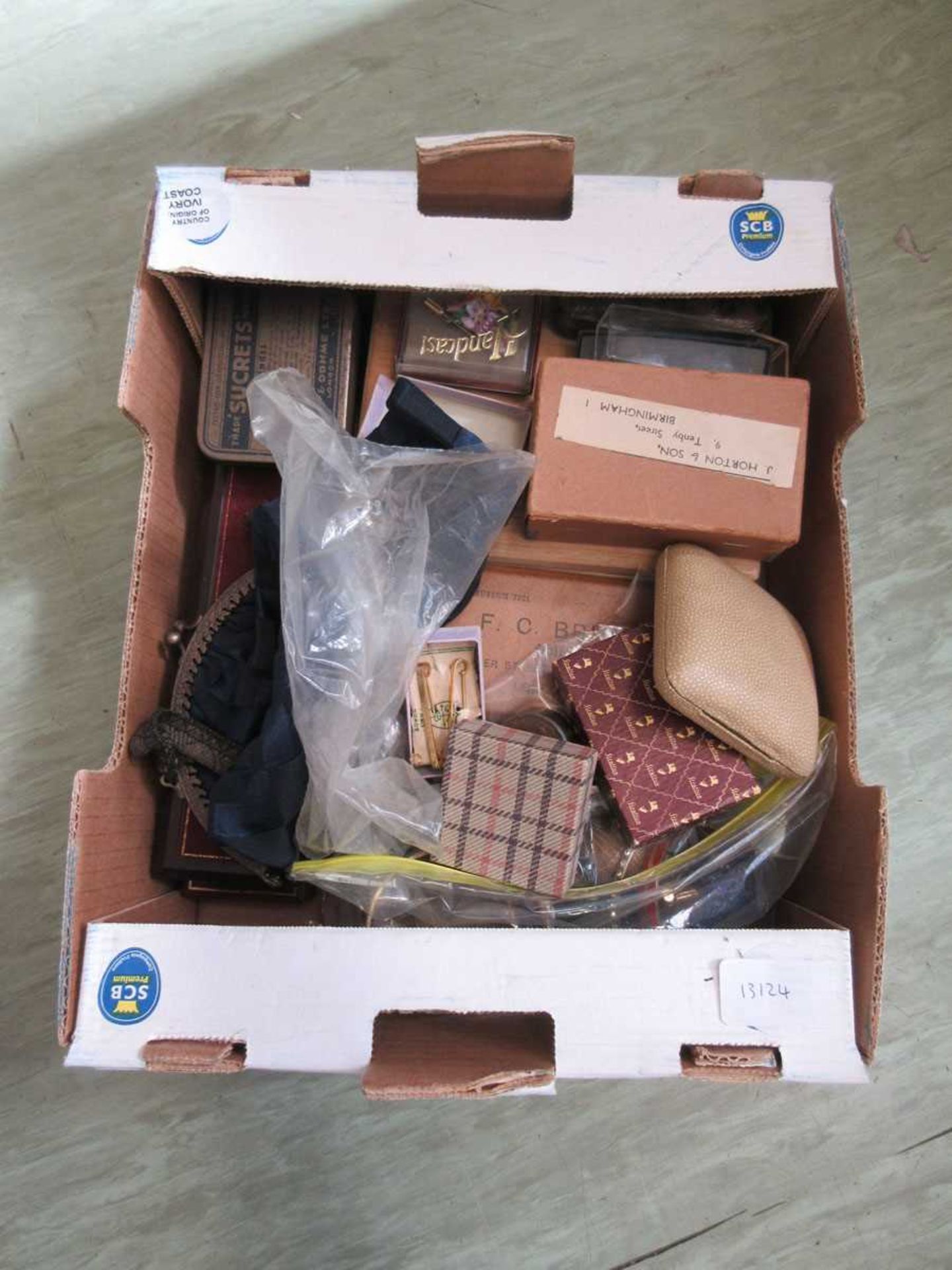 A box containing a quantity of costume jewellery along with collector's items, etc