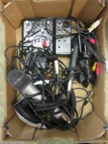 A tray containing broadcast items to include microphones, Behringer mixer, etc