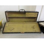 An early 20th century black painted toolbox