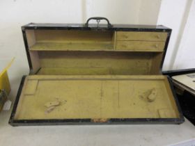 An early 20th century black painted toolbox