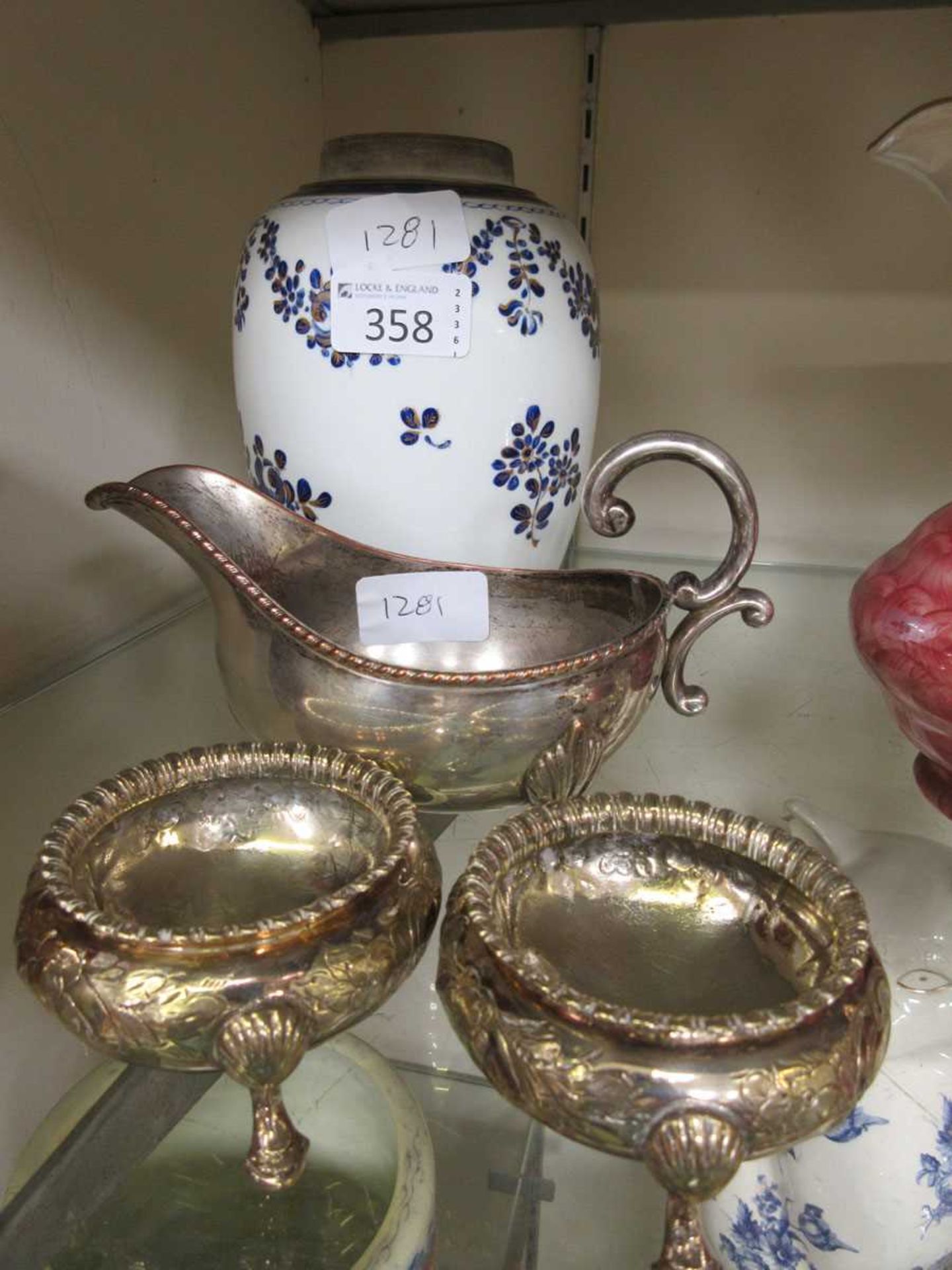 Three items of silver plated ware along with one ceramic vase