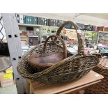 A wicker flower basket along with one other