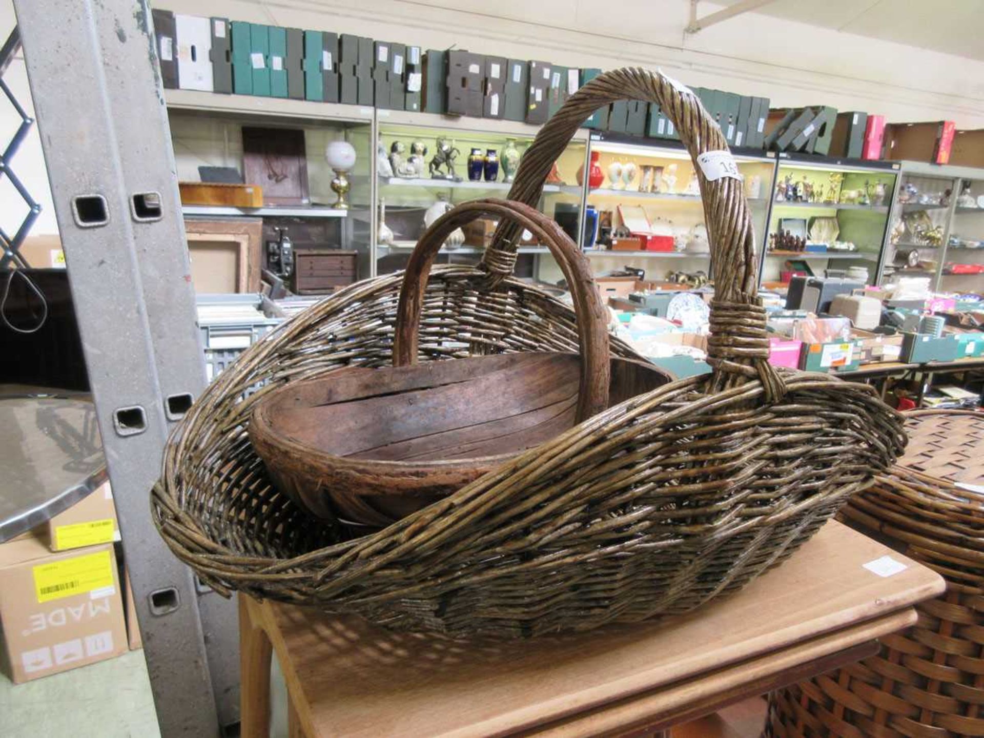 A wicker flower basket along with one other