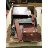 A tray containing a selection of various items to include wooden boxes, cased ruler, etc