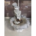 A lead birdbath the shell bowl with putto design