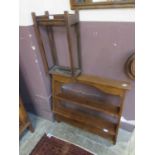 A set of wall mounted oak shelves together with an early 20th century oak stick stand