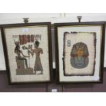 A pair of reproduction framed and glazed Egyptian papyrus prints