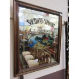 A reproduction framed Southern Comfort advertising mirror