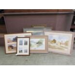 A collection of prints and watercolours of countryside scenes