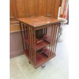 An Edwardian mahogany revolving bookcase