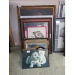 A collection of framed artworks and prints of various subjects to include still life, cats, etc