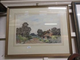 A framed and glazed watercolour of country barn scene