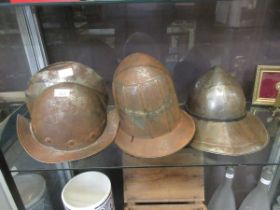 Three reproduction tin helmets