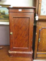 A stained pine pot cupboard