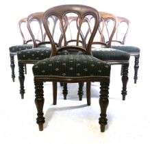 A set of six Victorian mahogany dining chairs, with stuff over seats, 88cm high