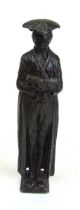 A cast lead figure of a schoolmaster, h. 28 cm