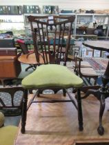 An early 20th century stained wooden bedroom chair with an overstuffed olive Draylon upholstered