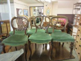 A harlequin set of six Victorian balloon back dining chairs