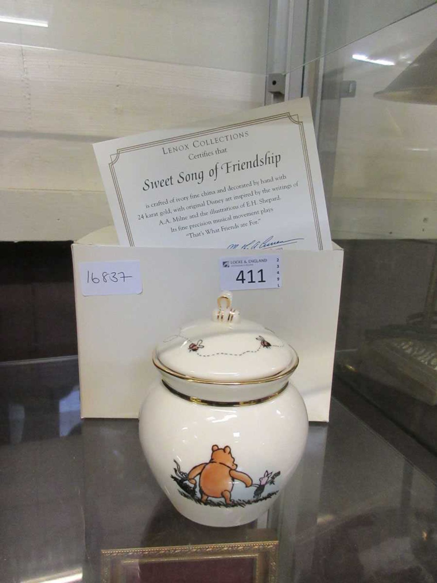 A boxed Winnie The Pooh pot by The Lennox Collection 'Sweet Songs Of Friendship' series